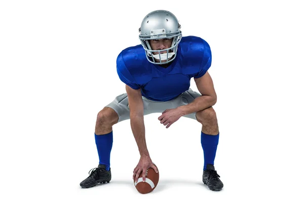 American football player placing ball — Stock Photo, Image