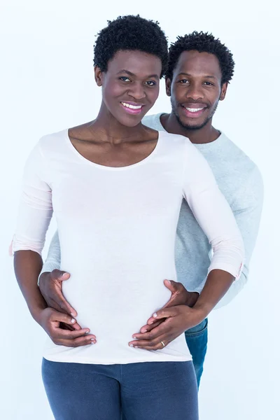 Husband embracing wife while standing — Stock Photo, Image