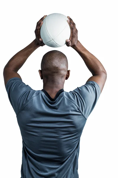 Atleta lanzando pelota de rugby —  Fotos de Stock