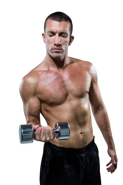 Shirtless athlete working out with dumbbell — Stock Photo, Image