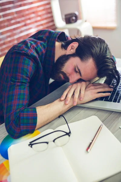 Tired creative businessman sleeping — Stock Photo, Image