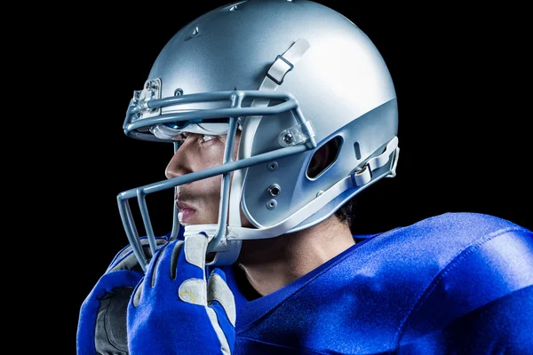 Sportsman wearing helmet looking away — Stock Photo, Image