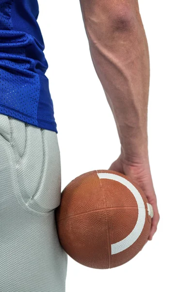 American football player holding ball — Stock Photo, Image