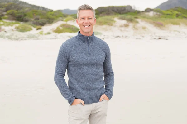 Man standing with hands in pockets — Stock Photo, Image