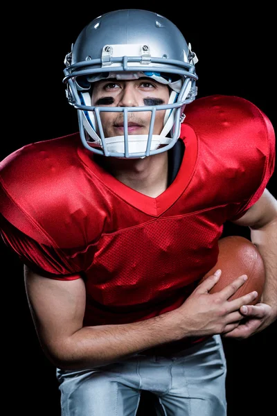 Jugador de fútbol americano con pelota — Foto de Stock