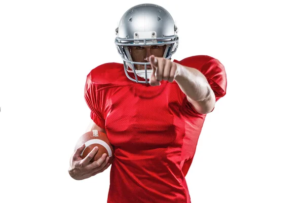 Sports player in red jersey pointing — Stock Photo, Image