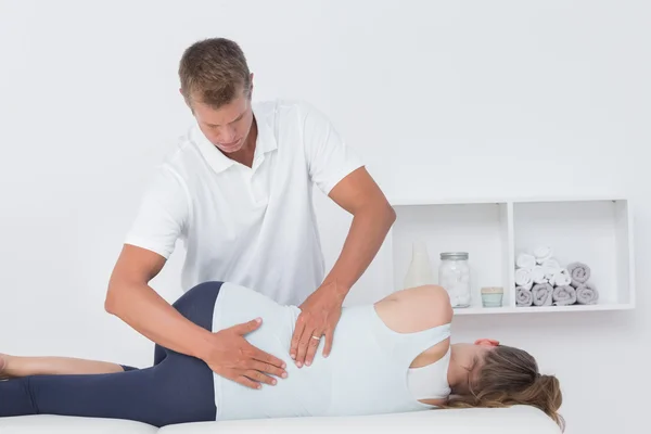 Doctor examining woman back — Stock Photo, Image