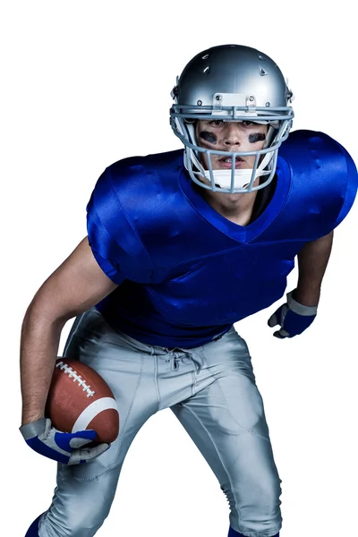 American football speler in uniforme spelen — Stockfoto