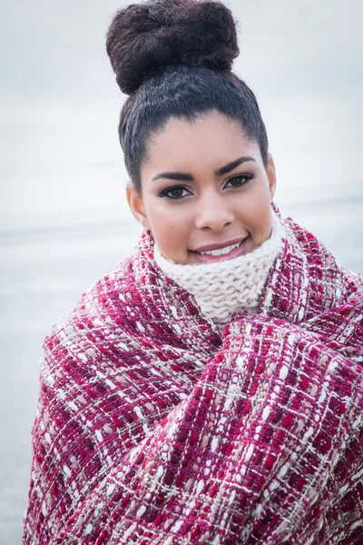 Woman wrapped up in warm clothing — Stock Photo, Image