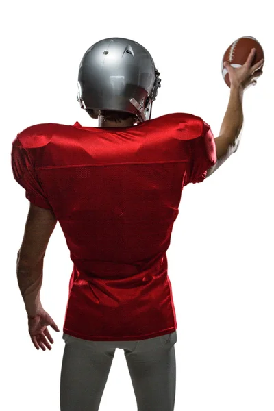 Sportoló-vörös trikó, tartja a labdát — Stock Fotó