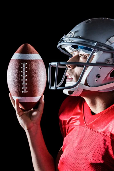 Sportler mit amerikanischem Fußball — Stockfoto