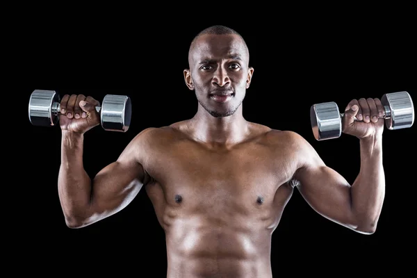 Atleet hijs halter tijdens het trainen — Stockfoto