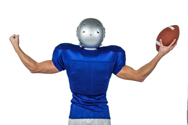 American football player flexing muscles — Stock Photo, Image