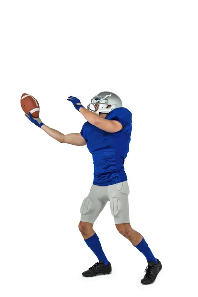 American football player catching ball — Stock Photo, Image