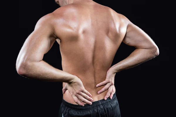 Shirtless man with back pain — Stock Photo, Image