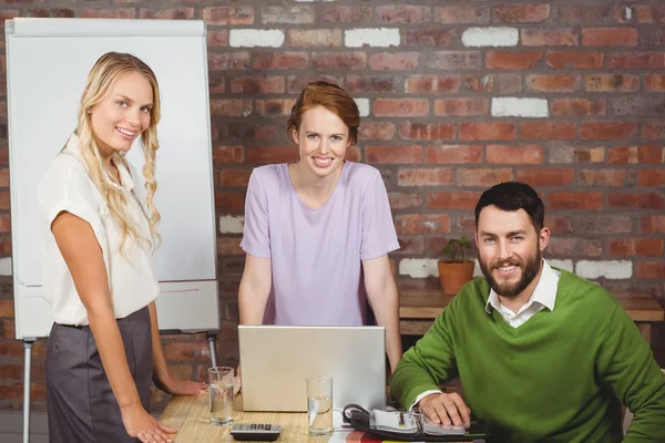 Business people smiling while discussing — Stock Photo, Image