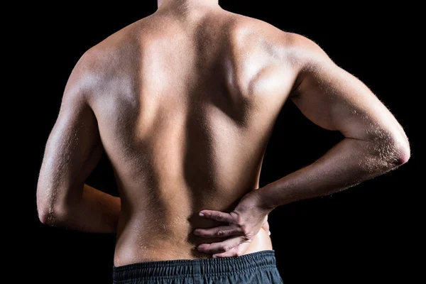 Hombre sin camisa con dolor de espalda —  Fotos de Stock