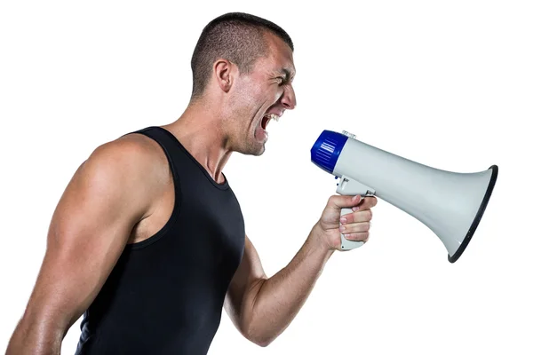 Trainer yelling through megaphone — Stock Photo, Image