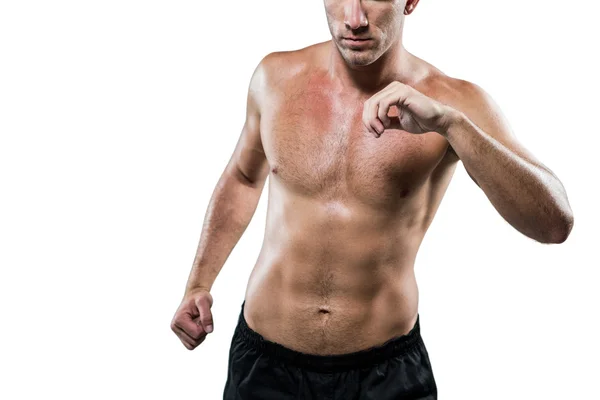 Shirtless athlete exercising — Stock Photo, Image