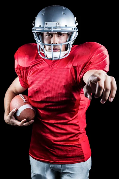 Sportler mit amerikanischem Fußball — Stockfoto