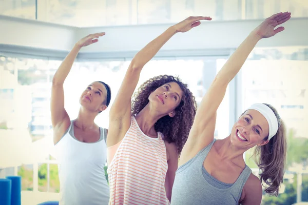 Sport women with arm raised — Stock Photo, Image