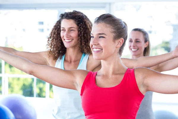 Cheerful women with arms outstretched — Stock Photo, Image