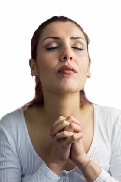 Woman praying with hands together — Stock Photo, Image