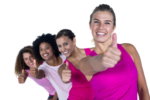 Portrait of happy women with thumbs up — Stock Photo, Image