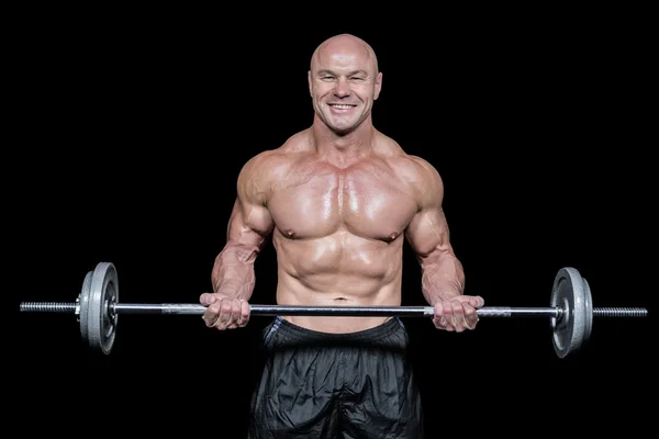 Portret van gelukkig gespierde man tillen crossfit — Stockfoto