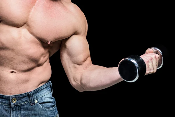 Midsection of man exercising lifting dumbbells — Stock Photo, Image