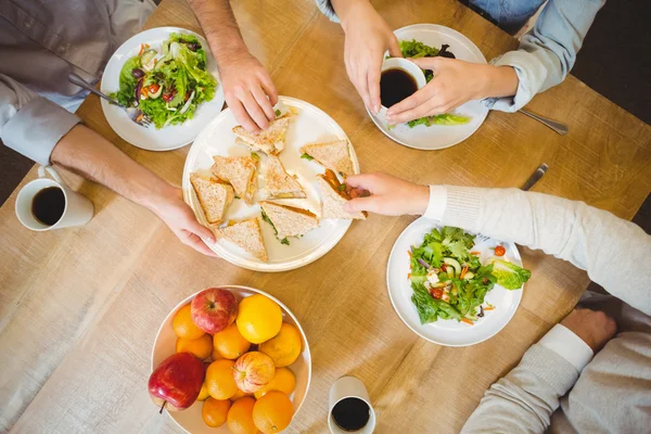 Business people having lunch in canteen — Stock Photo, Image