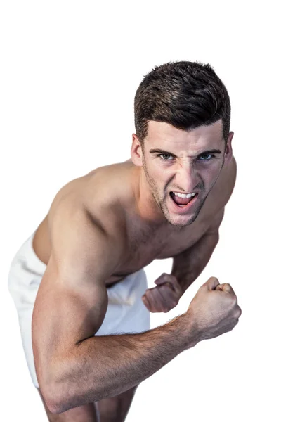 Porträt eines Mannes, der Muskeln zeigt — Stockfoto