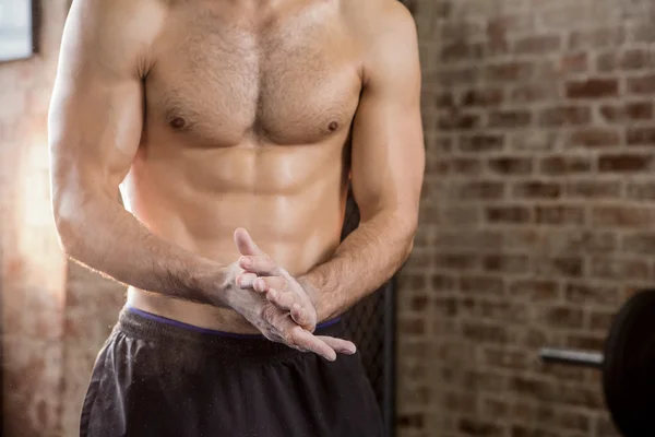 Midsection of a man applying chalk powder — Stock Photo, Image