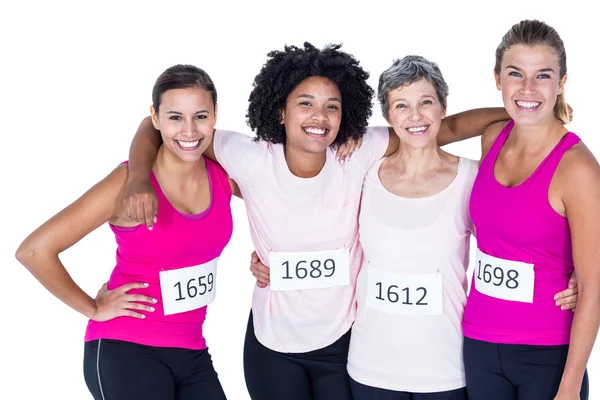 Portrait of happy female athletes with arms around — Stock Photo, Image