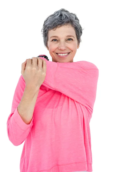 Portret van gelukkig volwassen vrouw die zich uitstrekt — Stockfoto