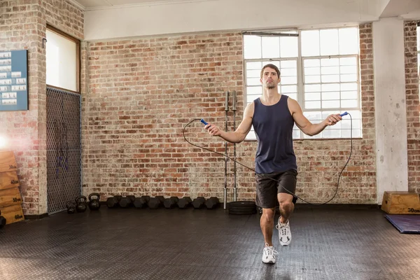 Man skipping wearing sportswear — Stock Photo, Image