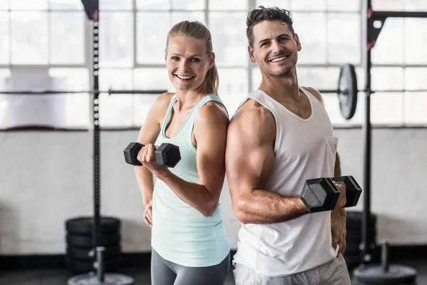 Zurück zu Rückenpaar beim Training mit Kurzhanteln — Stockfoto