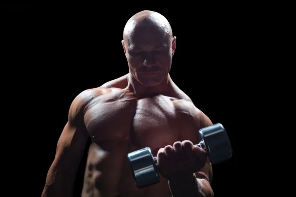 Geconcentreerde bodybuilder opheffing halter — Stockfoto