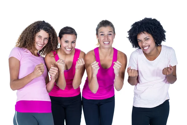 Retrato de grupo sorridente de mulheres com as mãos apertadas — Fotografia de Stock