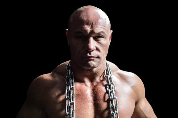 Portrait of confident muscular man with chain — Stock Photo, Image