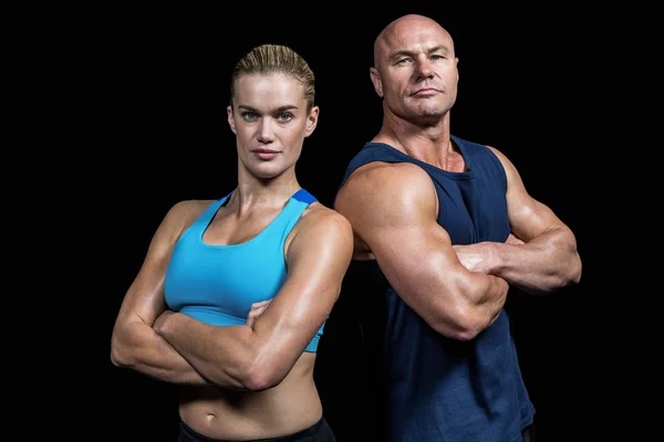 Portrait of confident strong man and woman — Stock Photo, Image