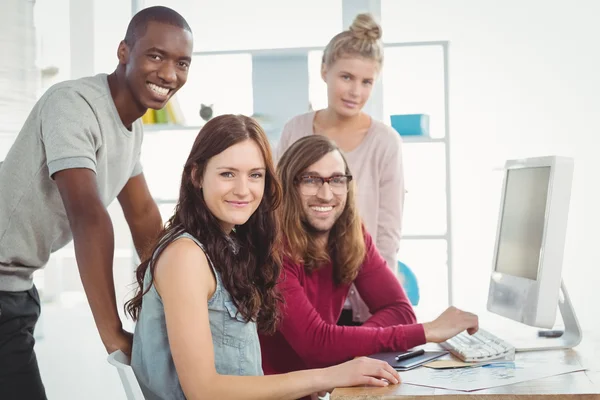 Portrait of happy business team working — Stok Foto