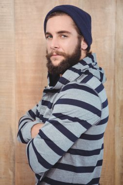 Portrait of confident hipster with hooded shirt clipart