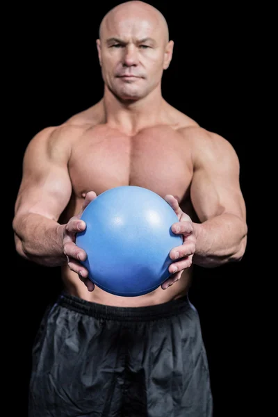 Portrait of bald man holding ball — Stock Photo, Image