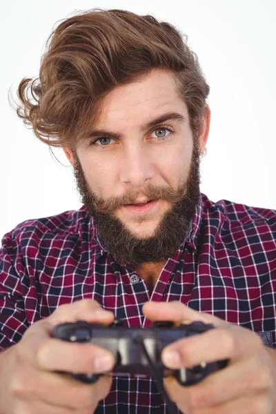 Porträtt av hipster spelar videospel — Stockfoto