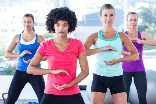 Fit women exercising with trainer — Stock Photo, Image