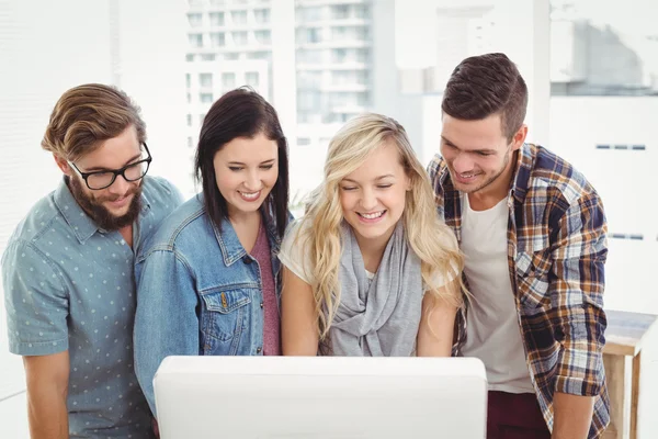 Smiling business people working at computer desk — Stock Photo, Image