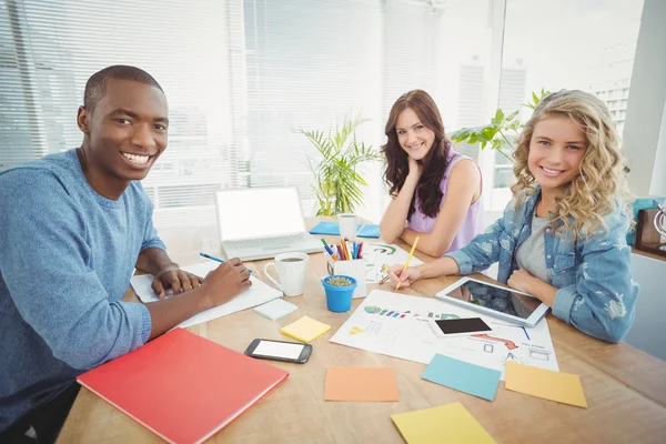 Portrait of happy business people working — Stock Photo, Image
