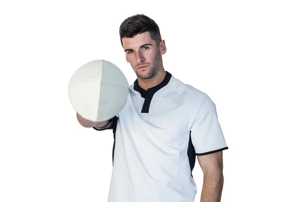 Portret van rugbyspeler die de bal met de ene hand — Stockfoto