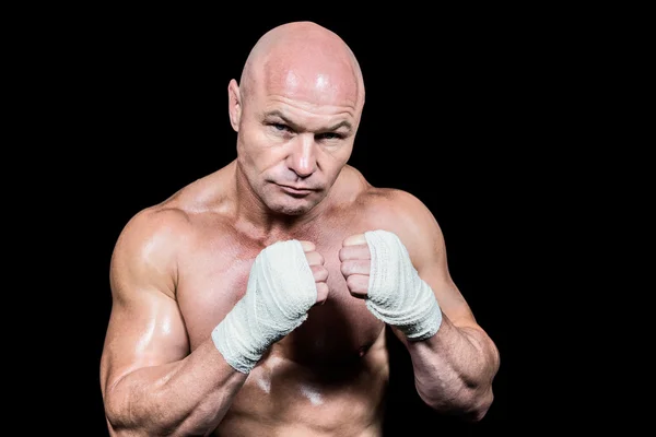 Portrait of confident man with fighting stance — Stock Photo, Image